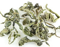 pale green dried herb pieces of Dyers Woad Leaf