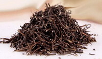 dried dark brownish herb segments and pieces of Chinese Clematis Root