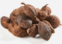 dried brownish fruits of Tsaoko are piled together