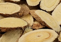 yellowish dried wild root slices of Astragalus Root