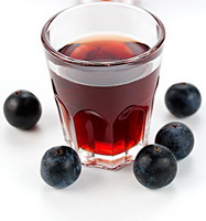 several Juniper Berries and gin
