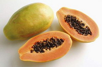 Papaya:a fruit and two havlves of fruit pulp