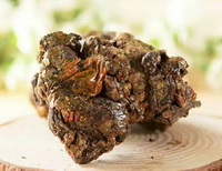 a brownish block of Propolis